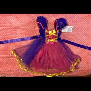 Tutu dreams rapunzel costume. Size 6-12 months new with packaging.